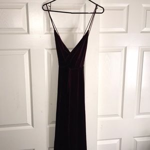 A burgundy cross back strapped dress